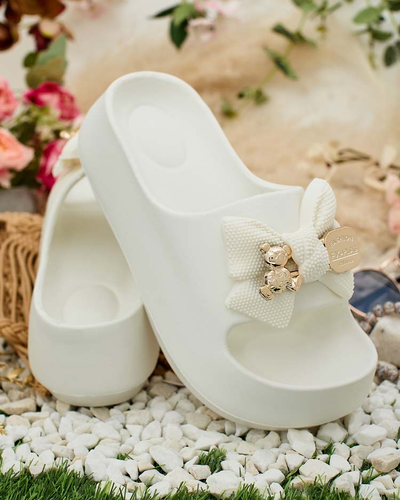 Royalfashion Women's rubber flip-flops with decorative bow Afeen