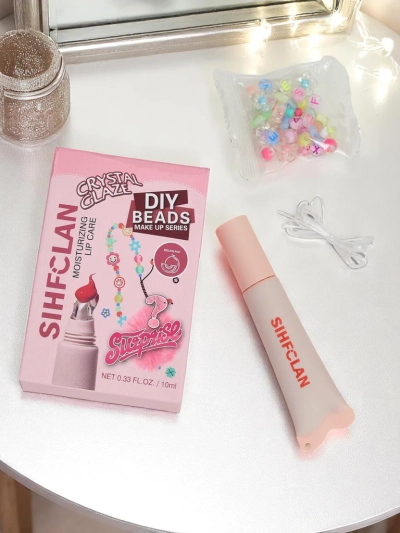 Lūpu spīdums ar rokassprādzi Gloss & Charm Melon Pop