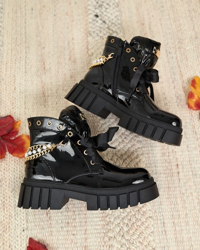 Royalfashion Women's lacquered insulated boots in black Dahaff