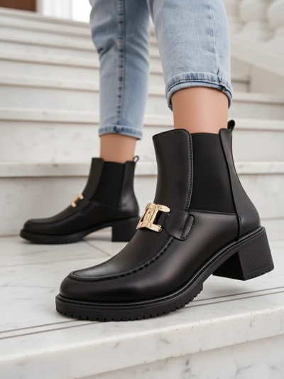 Royalfashion Women's ankle boots on a low heel Ewios