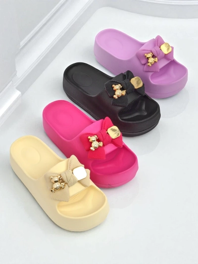 Royalfashion Women's rubber flip-flops with a decorative bow Alday