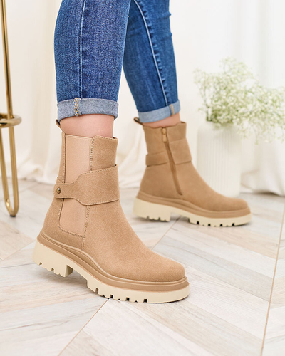 Royalfashion Bēšas krāsas sieviešu zābaki ar dekoratīvu siksniņu Doasa