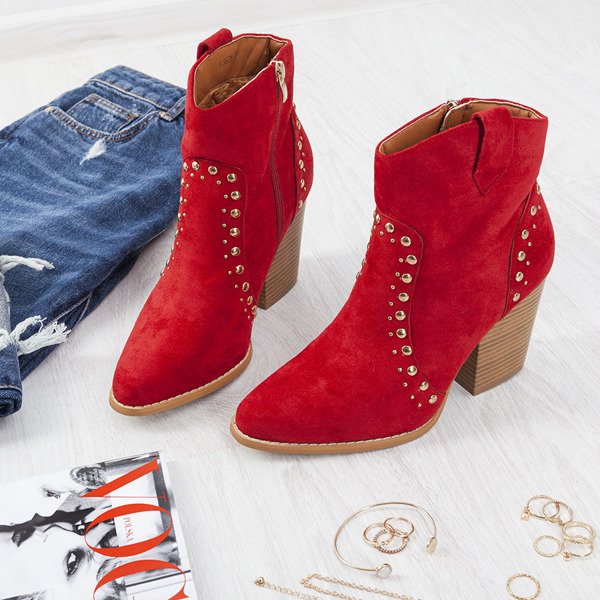 Red cowboy boots on a high Gana post - Footwear