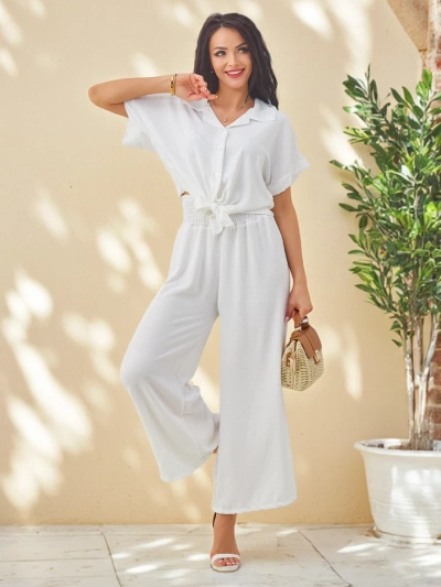 Royalfashion Женский комплект с завязанной короткос sleevesрубашкой и расклешенными брюками с стразами