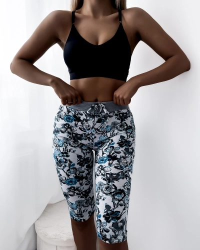 Royalfashion Женские узорчатые шорты 3/4 в белом и бирюзовом цвете PLUS SIZE