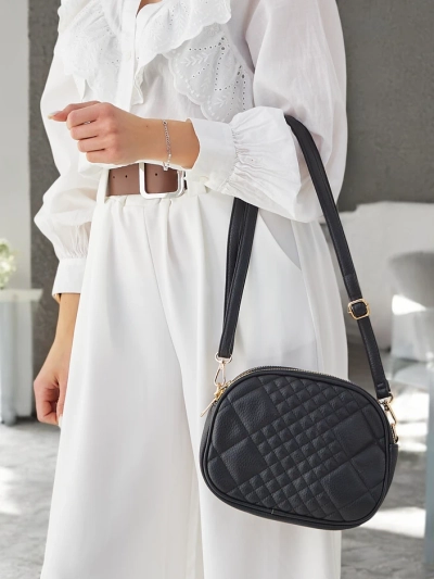 Royalfashion Small oval women's handbag made of eco leather