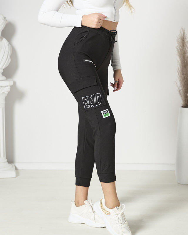 Sieviešu kaujas bikses ar uzrakstu melnā krāsā- Apģērbs