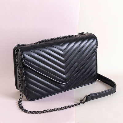 Black quilted messenger bag on a chain - Handbags