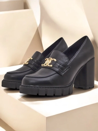 Women's Nero Aurora block heel pumps with a gold buckle, eco leather