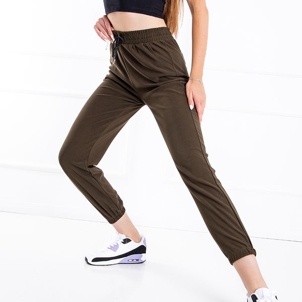 Zaļas sieviešu sporta bikses ar uzrakstu - Apģērbs