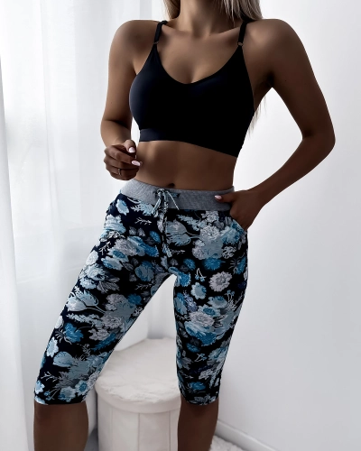 Royalfashion Dark blue women's 3/4 shorts with floral pattern PLUS SIZE