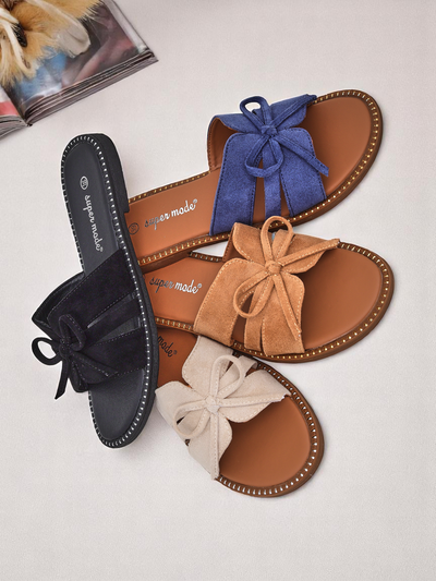 Royalfashion Women's flat sandals with a bow Gerber