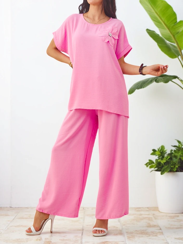 Royalfashion Женский комплект с коротким рукавом с декоративным цветком и широкими брюками