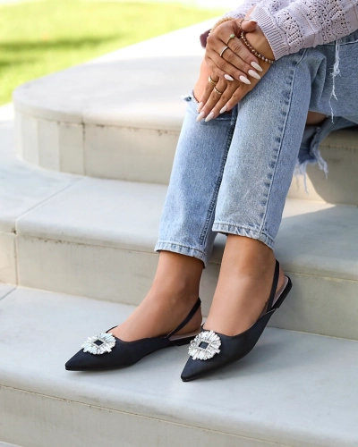 Black Etalli ballerina slippers. Footwear