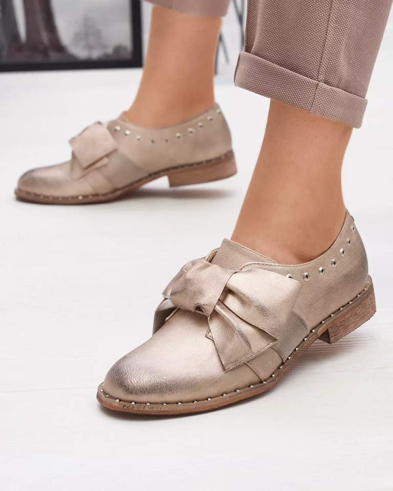 Gold women's low shoes with Entera bow - Footwear