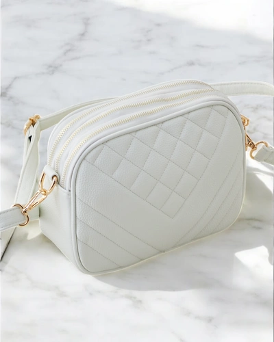 Royalfashion Small women's handbag made of eco-leather with embossing