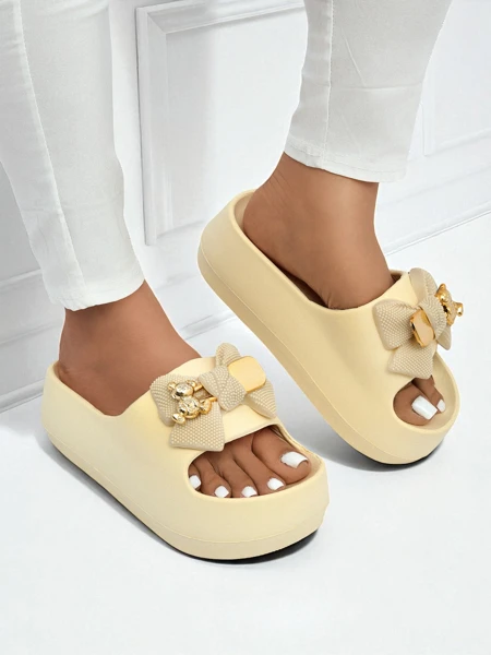 Royalfashion Women's rubber flip-flops with a decorative bow Alday