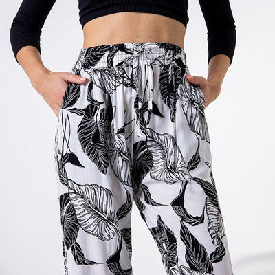 White women's pants with a floral pattern - Clothing