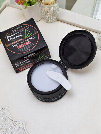 Sadoer zobu balinošais pulveris, kas noņem traipus no kafijas, tējas un tabakas