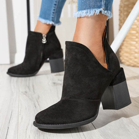 Women's boots on the post with cut-outs in black. Encura- Footwear