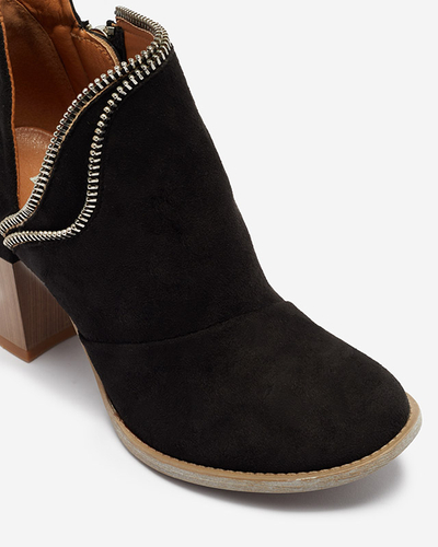 Black women's insulated boots on a post Mukis - Footwear