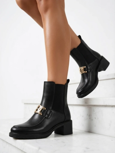 Royalfashion Sieviešu ķēžu zābaki uz zemu papēžu Ewios