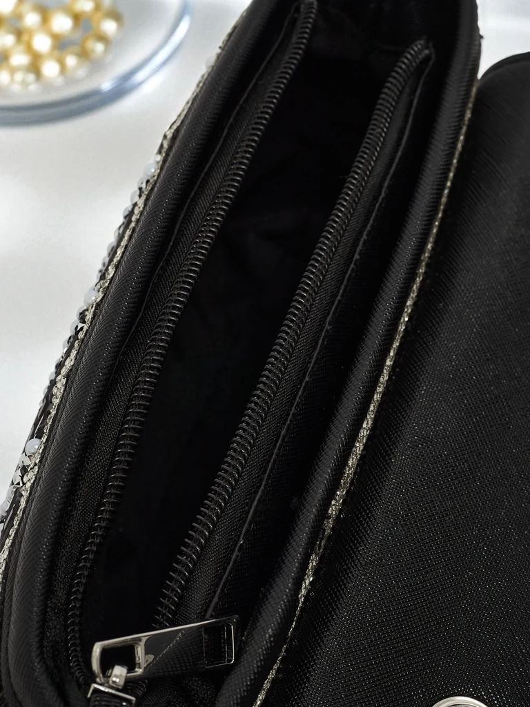 Kopertowa torebka damska z cyrkoniami Zyora