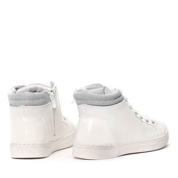 Białe sneakersy na koturnie- Obuwie