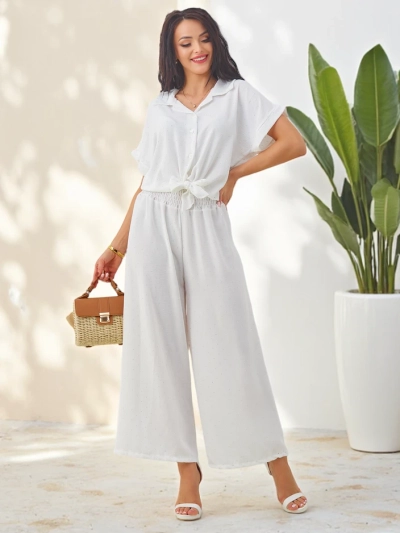 Royalfashion Женский комплект с завязанной короткос sleevesрубашкой и расклешенными брюками с стразами