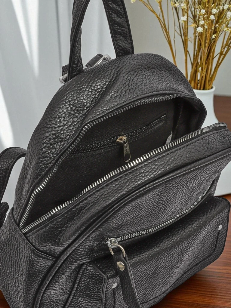 Astrea Królewska Moda women's black and white faux leather backpack