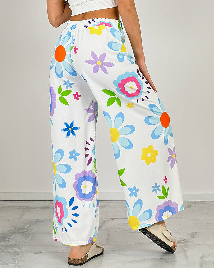 Royalfashion Sieviešu platās bikses ar ziedu rakstu