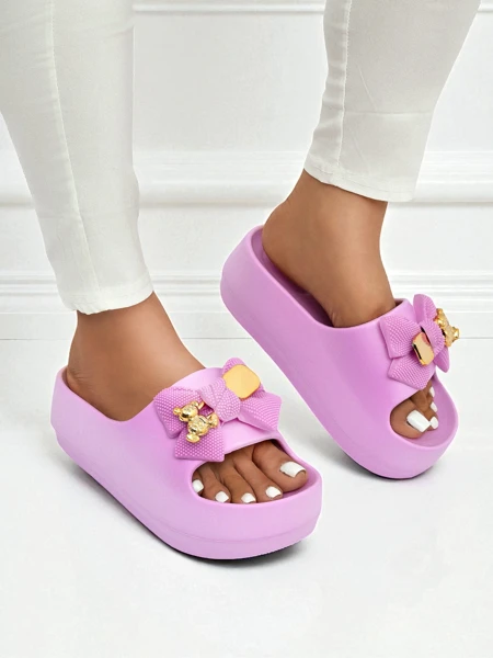 Royalfashion Sieviešu gumijas iešļūcenes ar dekoratīvu banti Alday