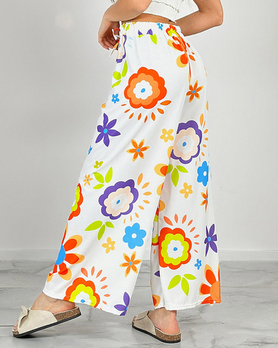 Royalfashion Sieviešu platās bikses ar ziedu rakstu