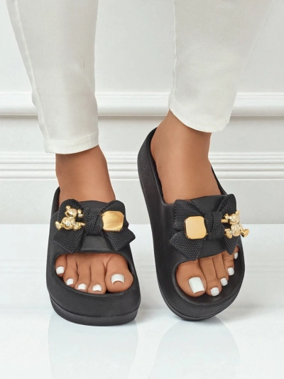 Royalfashion Women's rubber flip-flops with a decorative bow Alday