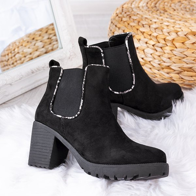 Black boots on a higher post Travolte - Footwear