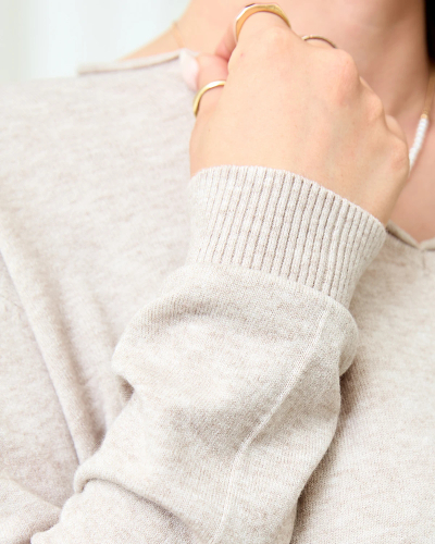 Royalfashion Beige-gray women's sweater with a heart neckline