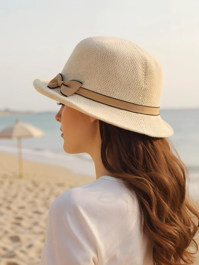 Royalfashion Women's hat decorated with a bow Summer Grace