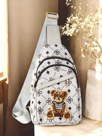 Royalfashion Small women's eco-leather backpack with a bear on one shoulder