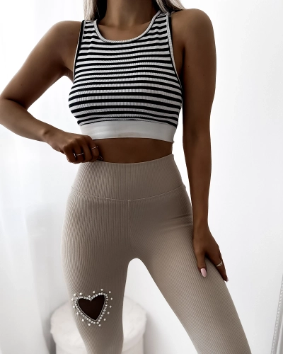 Women's leggings in beige with heart - Clothing