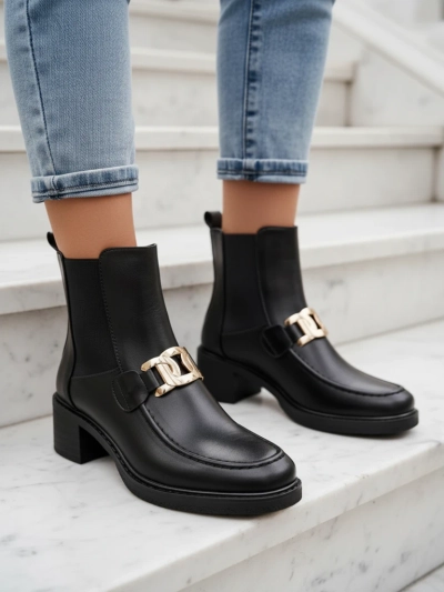 Royalfashion Women's ankle boots on a low heel Ewios