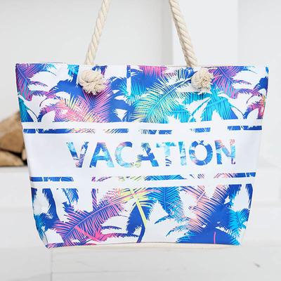 Blue beach bag with floral print - Accessories