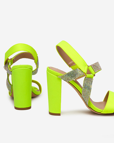 Neon yellow women's sandals on the Xiobi post. Footwear