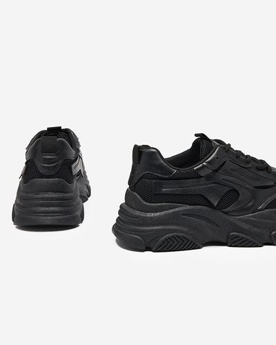 Black women's sports shoes on a massive Okis sole - Footwear