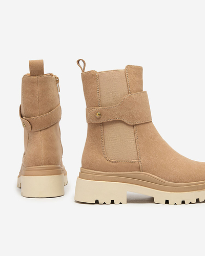 Royalfashion Bēšas krāsas sieviešu zābaki ar dekoratīvu siksniņu Doasa