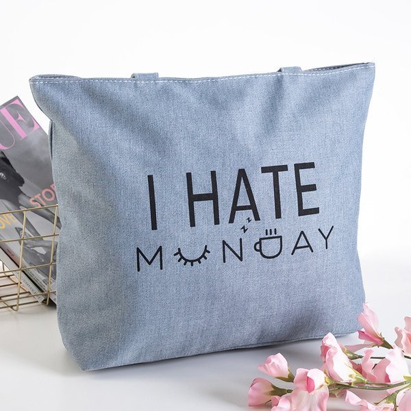 Серая сумка с надписью