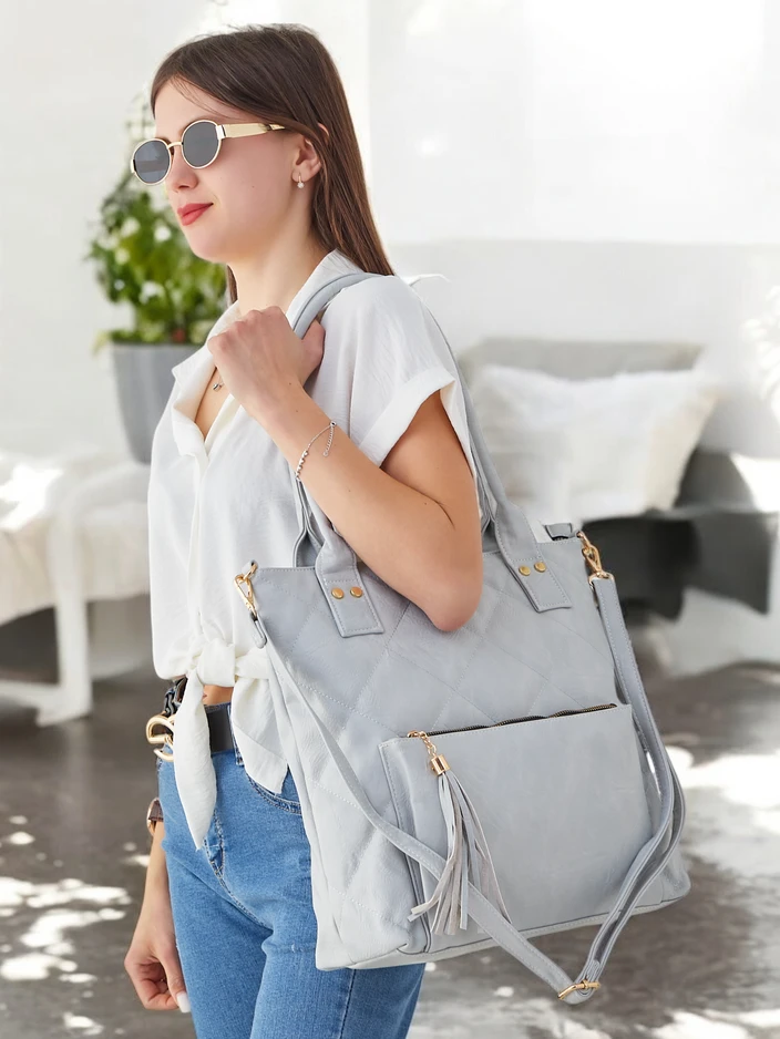 Royalfashion Women's quilted handbag made of eco-leather with a front pocket