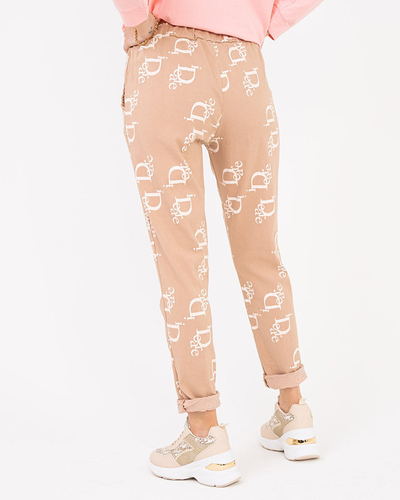 Ladies' beige fabric trousers with inscriptions - Clothing