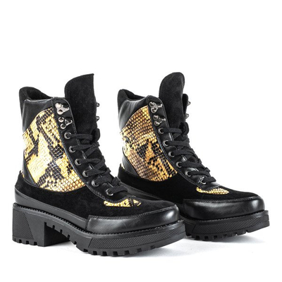 Black snakeskin imitation bags on a pole - Footwear