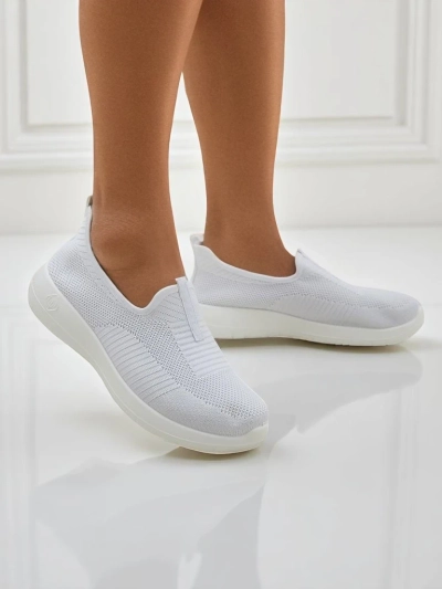 Women's white Callista slip-ons made of breathable fabric with a flat heel