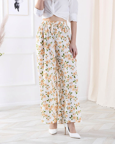 Женские белые брюки из ткани с цветочным рисунком - Одежда